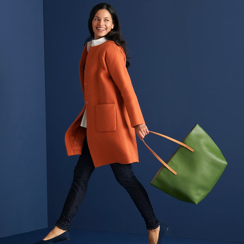 Woman carrying Vegan Leather Tote