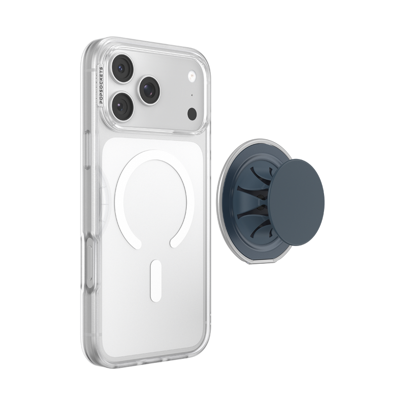 Expanded navy PopSockets Low-Pro grip beside an iPhone in a clear MagSafe case, illustrating magnetic attachment.