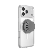 Gunmetal PopSockets Low-Pro phone grip extended on the back of a clear iPhone case.